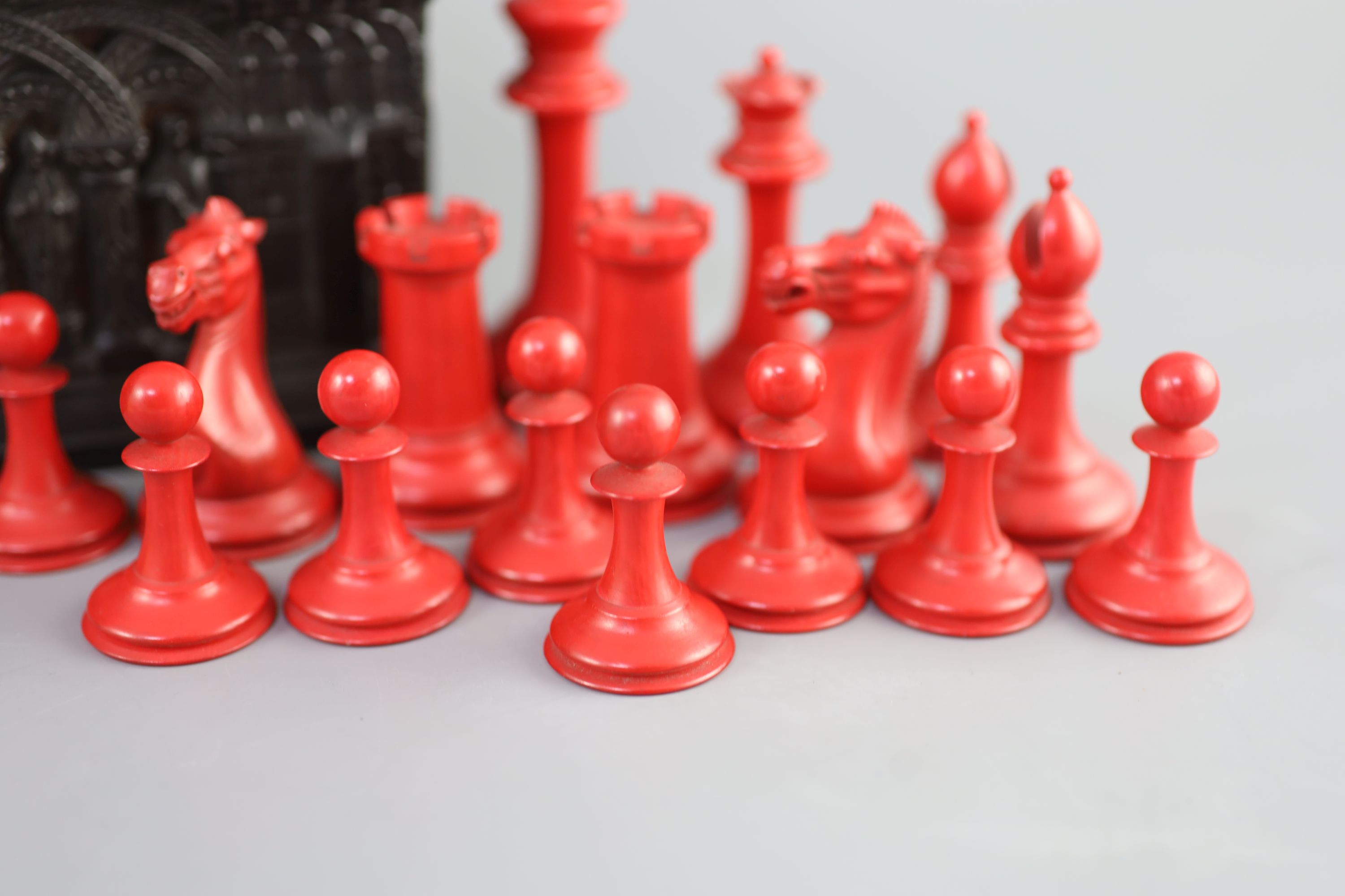 A Jaques of London red and white ivory 3 1/2